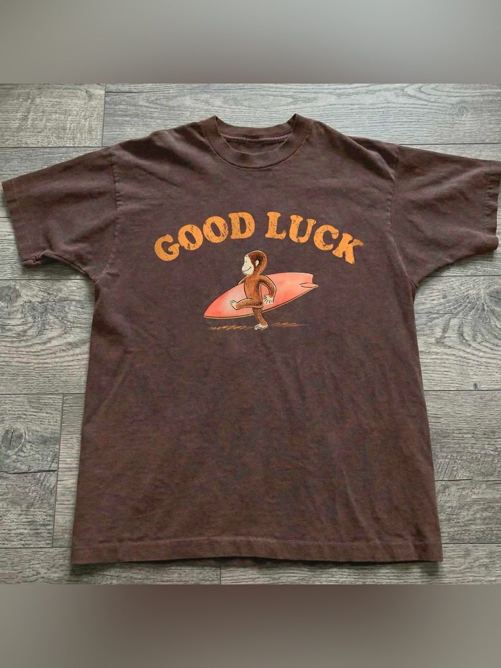 Gildan Brown Short Sleeve Tee with Orange 'Good Luck' Surf Graphic